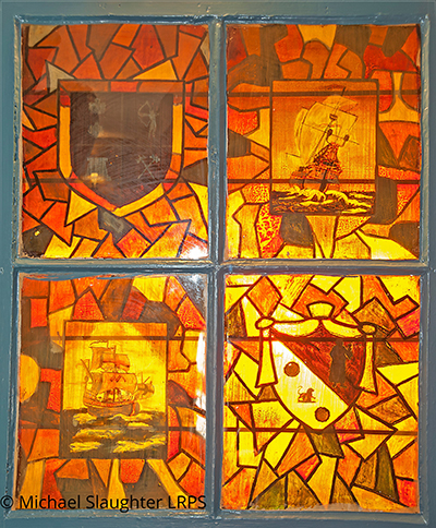 Painted Glass Window in Cellar Bar.  by Michael Slaughter. Published on 